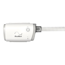 Load image into Gallery viewer, ResMed AirMini portable CPAP machine with a power button and Bluetooth icon on the front.