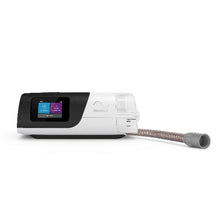 Load image into Gallery viewer, An AirSense 11 AutoSet CPAP machine with integrated humidifier and ClimateLineAir tubing, displayed against a white background.