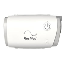 Load image into Gallery viewer, ResMed AirMini portable CPAP machine with a power button and Bluetooth icon on the front.